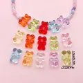 Detailed view of colorful translucent acrylic gummy bear beads featuring size annotations - Horizontal Hole Bear Set (SN1712)