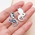 Close-up showing the intricate front enamel and textured back of Western dragon charms - Roaring Fire Dragon (28012)