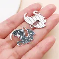 Detailed view of gothic dragon charms showing enameled front and textured back - Black Silver War Dragon (28018)