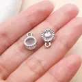Detailansicht von versilberten Zirkonia-Anhängern für die DIY-Ohrringherstellung - Runder Anhänger (27785) / 12x8x5mm / Silber
