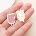 Close-up of pink medical IV bag enamel charm and gold eagle engraved pendant for DIY jewelry - Pink Drip Oil Infusion Bottle (23048) / 1 Piece (28x15mm)