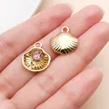 Elegant gold-plated shell charm with pink rhinestone inlay for DIY jewelry crafting - Gold Pink Rhinestone Shell (28173)