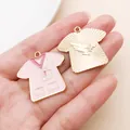 Pink enamel medical nurse uniform charm featuring golden metal eagle sunburst design - Pink Drip Oil Nurse Uniform (23056)
