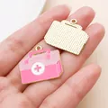 Pink enamel first-aid kit pendant charm for DIY earring and jewelry making projects - Pink Drip Oil First Aid Box (27887)