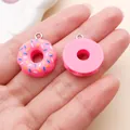 Detail view of pink resin donut charms with colorful sprinkles for DIY jewelry making - Round Donut (17181) / 1 Piece (18x21mm) / Rose Red