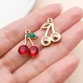 Detailed view of red rhinestone cherry charms with gold bases for DIY jewelry making - KC Gold Red Green Rhinestone Cherry