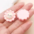 Twee leuke roze bloem bedeltjes van hars met smileys voor het maken van DIY sieraden. - Zonnebloem (24783) / 1 Stuks/Verpakking (26x22x7mm) / Roze