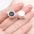 Detailed view of miniature white resin coffee cup charms for DIY jewelry and crafts - Regular Coffee Cup (23958)