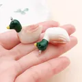 Gedetailleerde hars wilde eend bedeltjes voor DIY telefoonhoesjes en sieraden - 1 Stuk (27x16x30mm)