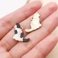 Cute calico cat enamel charm with gold-plated finish for DIY jewelry and crafts. - Enamel Printed Cow Cat (27753) / 1 Piece/Pack (18x18mm) / Black and White
