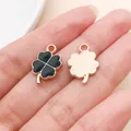 Detailed view of black enamel four-leaf clover charms for DIY jewelry and crafts - Four-Leaf Clover (11914)
