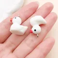 Macro view of cute white resin little duck charms for DIY jewelry and keychain accessories - Little Duck (17218) / 1 Piece Pack (17x19mm)