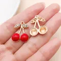 Gold-tone cherry pendant charms with red resin and rhinestones for DIY jewelry making. - KC Gold Red Enamel Rhinestone Half Cherry