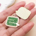 Close-up of green "Let's Study" enamel chalkboard charms for DIY jewelry making. - Green Let's study Blackboard (27446) / 1 Piece (23x26mm)