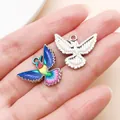 Close-up of colorful hummingbird charm and silver base for DIY jewelry making - Wings Spread Hummingbird Charm (27646)