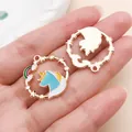 Rainbow unicorn alloy pendant showing enamel front and metal back details - Round Unicorn Ring (11453)