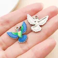 Hummingbird charms for jewelry making, one silver and one colorful enamel finish - Wings Spread Hummingbird Charm (27649)