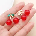 Red cherry pendants with green rhinestone leaves for DIY jewelry making - KC Gold Transparent Red Resin Green Rhinestone Cherry