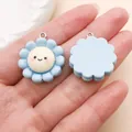 Detailed view of cute blue resin flower charm with a smiley face for DIY jewelry - Sun Flower Sunflower Smiley Face (24784)
