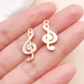 Breloques notes de musique en or rose avec émail blanc et cristal pour bijoux DIY - Style Note de Musique (19595) / 1 Pièce (9x21mm) / Blanc