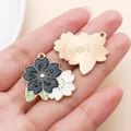 Elegant black and white cherry blossom enamel charm with a gold-toned textured metal backing - Large Cherry Blossom (14764)
