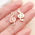 Breloques clé de sol en or rose avec émail rose et détail en cristal brillant - Style Note de Musique (19596) / 1 Pièce (9x21mm) / Rose