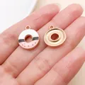 Enamel donut shaped pendant charm in pink and white finish for DIY jewelry accessories - Pink White Donut (24690)
