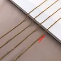 Close-up of 2.0mm gold-plated stainless steel woven chain necklace showing fine details - 0.8x2x2mm (1 Meter) / Gold