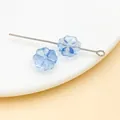 Primer plano de cuentas de trébol de cristal azul claro de 10mm para hacer joyas DIY - Azul transparente