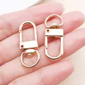 Close-up of rose gold zinc alloy lobster clasps for DIY keychain and bag hardware - Oval Door Clasp (26631)