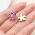 Petit pendentif fleur en émail violet avec perle et fleur en or rose pour bijoux DIY - Fleur de Cerisier à Perles (17542)