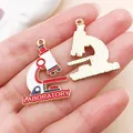 Enamel microscope pendant charm in gold-plated alloy for DIY necklaces and crafts - Red Microscope (27455)