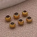 Sechs goldfarbene Edelstahl-Rundperlen mit Löchern für die DIY-Schmuckherstellung - Runde Perle (T2162) / 2x2x1mm / Gold