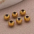 Set mit sechs goldenen runden Distanzperlen aus Edelstahl mit Löchern für Schmuck - Runde Perle (T2164) / 3x3x2mm / Gold