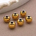 Set mit 6 polierten goldenen Edelstahl-Rundperlen mit Durchgangslöchern für Schmuck - Runde Perle (T2166)