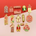 Detailed view of Chinese style golden DIY jewelry charms with various auspicious motifs - Enamel Chinese Style Antique Matte Gold Scholar Accessory Set (SN1161) / 15 Pieces/Pack / Gold