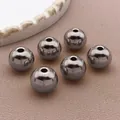 Set aus sechs metallisch grauen Edelstahl-Rundperlen mit Durchgangsloch für Schmuck - Runde Perle (T2177)
