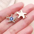 Elegant gold starfish charm connector with blue evil eye and sparkling crystals for DIY necklaces - Starfish Evil Eye Double Hole Connector (15239) / 1 Piece (17x12mm) / Gold
