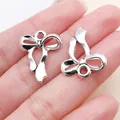 Dijes de lazo de plata antigua para la creación de joyas DIY y colgantes de collar - Colgantes de lazos de plata antigua