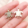 Golden zinc alloy sea turtle charm with clear rhinestones for DIY jewelry necklace making - Double-Loop Ocean Turtle Connector (27119) / 1 Piece (19x14mm) / Gold