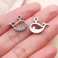 Detailed silver whale pendant with rhinestones for DIY jewelry, showcasing front and back - Rhinestone Ocean Whale Pendant (27126) / 1 Piece (14x15mm) / Silver