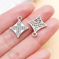 Detailed view of rhinestone-encrusted star cross pendants for DIY jewelry making - Plated White K Rhinestone Star Cross (27138)