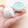 Detailed view of miniature resin coffee cup with mint green heart latte art pattern - Two-Layer Heart Latte Art (24792) / Teal