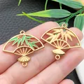Close-up of Chinese style fan-shaped charms with green enamel bamboo leaves - Bamboo Leaf Fan (22456) / 1 Piece/Pack (30x27mm) / Green
