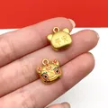 Detailed macro shot of golden lucky cat enamel charms for DIY necklace jewelry making - 1 Piece (14x13mm)