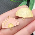 Detailed macro view of Chinese style fan-shaped alloy charms with pink enamel finish - Plum Blossom Fan (22453) / 1 Piece/Pack (24x19mm) / Pink