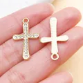 Close-up detail of gold-plated alloy cross pendants decorated with sparkling rhinestones - Plated KC Gold Rhinestone Cross (27075)