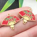 Red enamel fan charm with green bamboo leaf pattern for DIY jewelry making accessories. - Bamboo Leaf Double-Sided Fan (22448) / 1 Piece (24x21mm) / Red