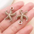 Par de dijes de estrella de mar de acrílico marrón y blanco para crear joyería DIY - Estrella de Mar Oceánica (27392) / Pack de 1 (24x18mm) / Marrón