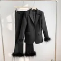 Elegant black blazer and trouser suit set featuring stylish ostrich feather trim - S / Top And Bottom / Black